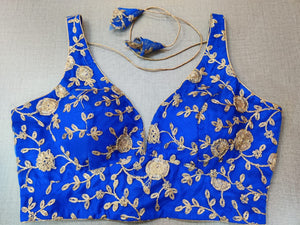 Shop beautiful ink blue sleeveless sari blouse online in USA with golden embroidery. Elevate your Indian ethnic sari looks with exquisite readymade saree blouse, embroidered saree blouses, Banarasi sari blouse, designer saree blouse from Pure Elegance Indian clothing store in USA.-full view
