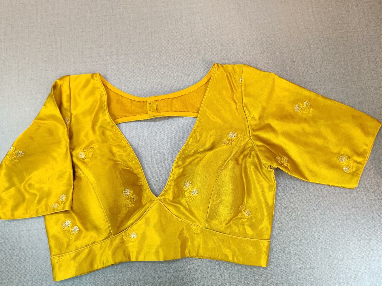 Buy stunning golden yellow readymade saree blouse online in USA. Elevate your Indian ethnic sari looks with exquisite readymade saree blouse, embroidered saree blouses, Banarasi saree blouse, designer saree blouse from Pure Elegance Indian clothing store in USA.-front
