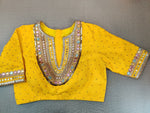 Buy beautiful bright yellow embroidered saree blouse online in USA with mirror work. Elevate your Indian ethnic sari looks with exquisite readymade saree blouse, embroidered saree blouses, Banarasi saree blouse, designer saree blouse from Pure Elegance Indian clothing store in USA.-front