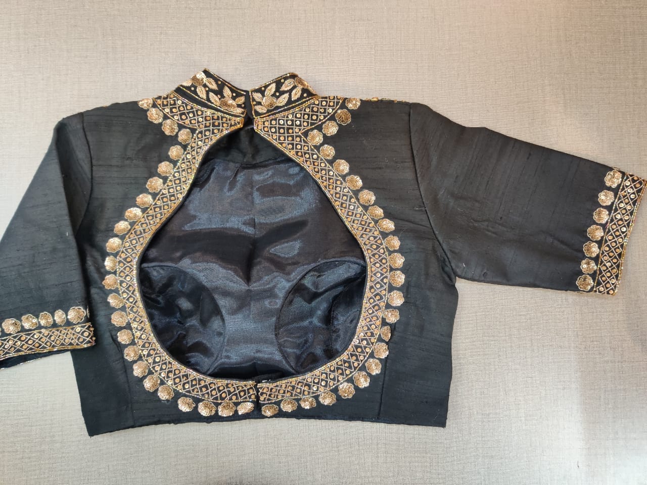 Shop stunning black embroidered designer saree blouse online in USA. Elevate your Indian ethnic sari looks with exquisite readymade saree blouse, embroidered saree blouses, Banarasi saree blouse, designer saree blouse from Pure Elegance Indian clothing store in USA-back