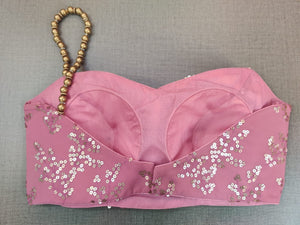 Buy stunning dusty pink embroidered saree blouse online in USA with one shoulder strap. Elevate your Indian ethnic saree looks with beautiful readymade saree blouse, embroidered saree blouses, Banarasi saree blouse, designer saree blouse from Pure Elegance Indian clothing store in USA.-back