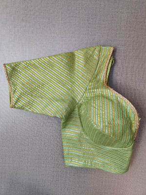 Buy stunning green and golden readymade saree blouse online in USA. Elevate your Indian ethnic saree looks with beautiful readymade saree blouse, embroidered saree blouses, Banarasi saree blouse, designer saree blouses from Pure Elegance Indian fashion store in USA.-sleeves