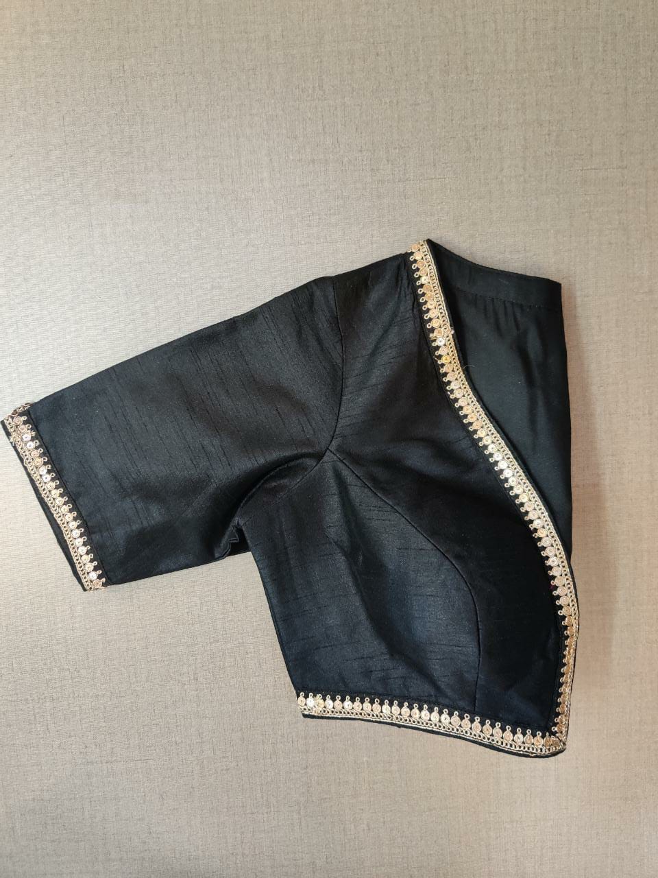 Buy gorgeous black readymade sari blouse online in USA with sequin work. Elevate your Indian ethnic saree looks with beautiful readymade saree blouse, embroidered saree blouses, Banarasi saree blouse, designer saree blouses from Pure Elegance Indian fashion store in USA.-sleeves