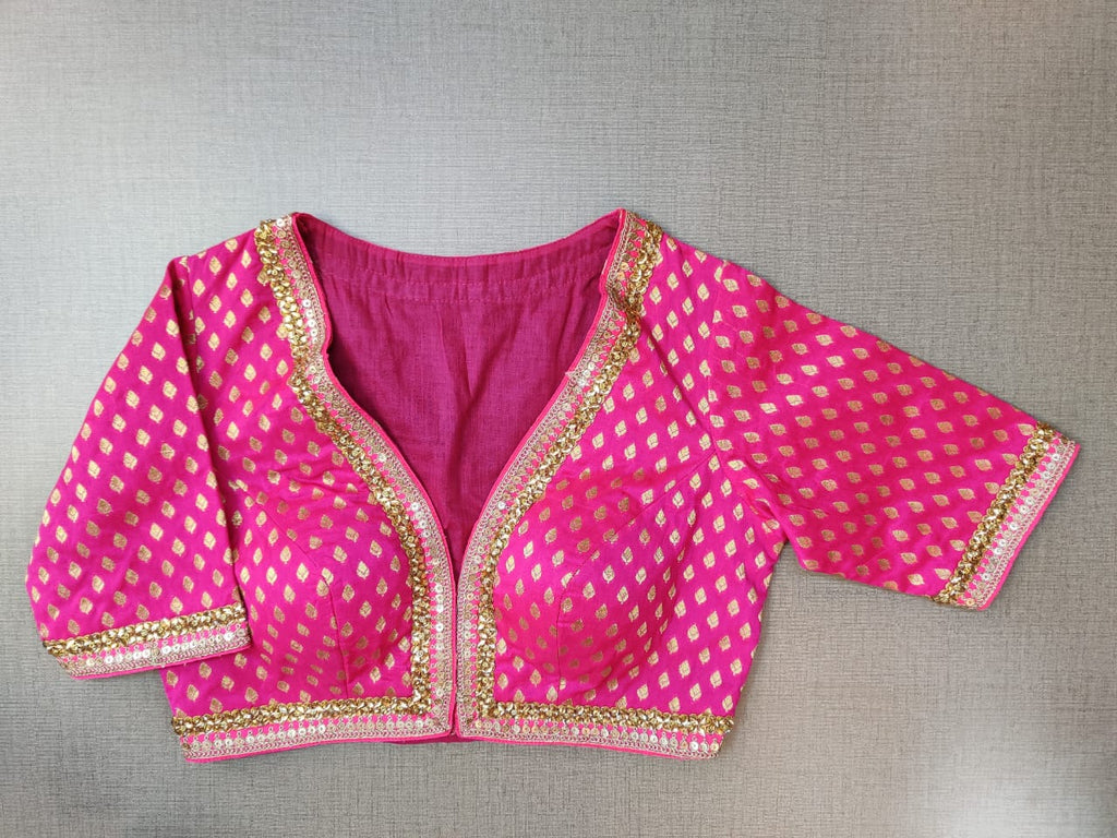 Shop beautiful fuschia pink embroidered Banarasi saree blouse online in USA. Elevate your Indian ethnic saree looks with beautiful readymade saree blouse, embroidered saree blouses, Banarasi saree blouse, designer saree blouses from Pure Elegance Indian fashion store in USA.-front