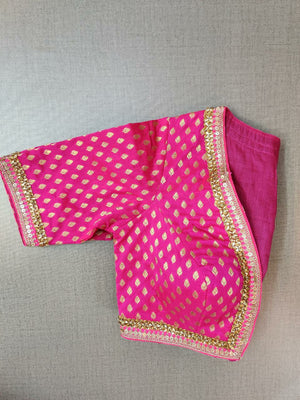 Shop beautiful fuschia pink embroidered Banarasi saree blouse online in USA. Elevate your Indian ethnic saree looks with beautiful readymade saree blouse, embroidered saree blouses, Banarasi saree blouse, designer saree blouses from Pure Elegance Indian fashion store in USA.-sleeves