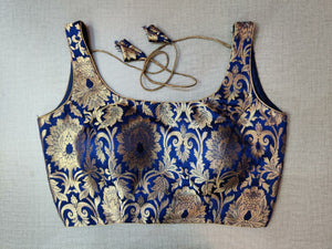 Buy stunning dark blue sleeveless Banarasi sari blouse online in USA. Elevate your Indian ethnic saree looks with beautiful readymade sari blouse, embroidered saree blouses, Banarasi saree blouse, designer sari blouses, sleeveless saree blouses from Pure Elegance Indian fashion store in USA.-front