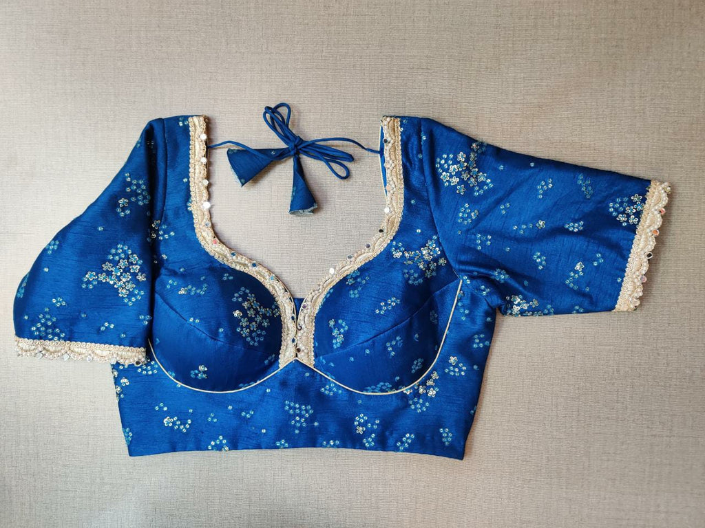 Shop stunning royal blue embrodiered saree blouse online in USA with lace. Elevate your Indian ethnic saree looks with beautiful readymade sari blouse, embroidered saree blouses, Banarasi saree blouse, designer saree blouses, sleeveless saree blouses from Pure Elegance Indian fashion store in USA.-front