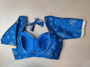 Shop stunning royal blue embrodiered saree blouse online in USA with lace. Elevate your Indian ethnic saree looks with beautiful readymade sari blouse, embroidered saree blouses, Banarasi saree blouse, designer saree blouses, sleeveless saree blouses from Pure Elegance Indian fashion store in USA.-back