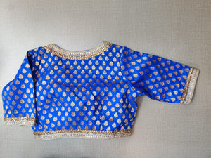 Buy stunning blue Banarasi saree blouse online in USA with embroidery. Elevate your Indian ethnic saree looks with beautiful readymade sari blouse, embroidered saree blouses, Banarasi saree blouse, designer saree blouses, sleeveless saree blouses from Pure Elegance Indian fashion store in USA.-back