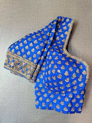 Buy beautiful blue designer saree blouse online in USA with golden embroidery. Elevate your Indian ethnic saree looks with beautiful readymade sari blouse, embroidered saree blouses, Banarasi saree blouse, designer saree blouses, sleeveless saree blouses from Pure Elegance Indian fashion store in USA.-sleeves