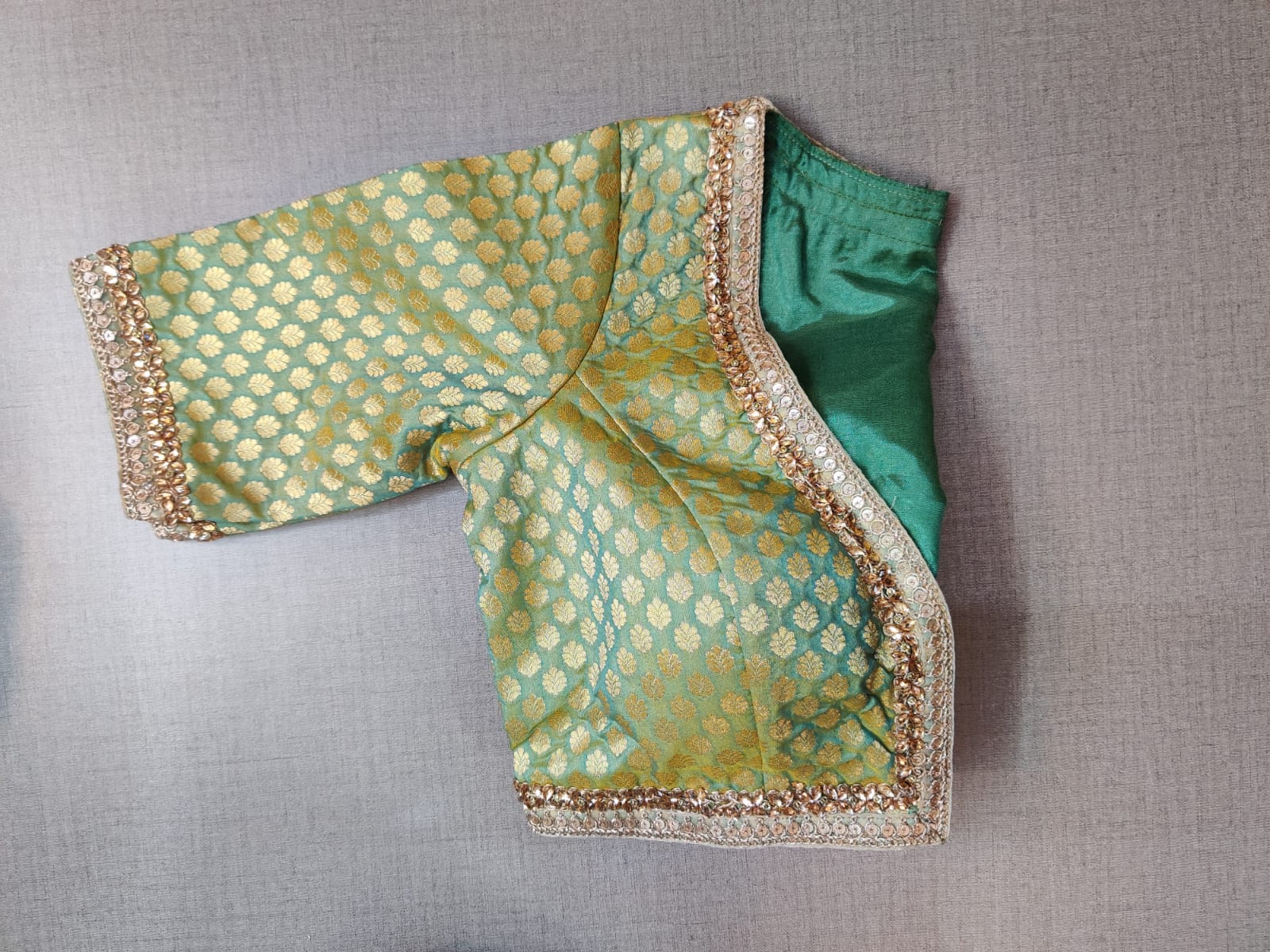 Buy beautiful light green Banarasi saree blouse online in USA with embroidery. Elevate your Indian ethnic saree looks with beautiful readymade sari blouse, embroidered saree blouses, Banarasi saree blouse, designer saree blouses, sleeveless saree blouses from Pure Elegance Indian fashion store in USA.-sleeves