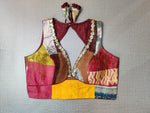 Buy beautiful multicolor patch sleeveless saree blouse online in USA with Kantha stitch. Elevate your Indian ethnic saree looks with beautiful readymade saree blouse, embroidered saree blouses, Banarasi saree blouse, designer sari blouses, sleeveless saree blouses from Pure Elegance Indian fashion store in USA.-front
