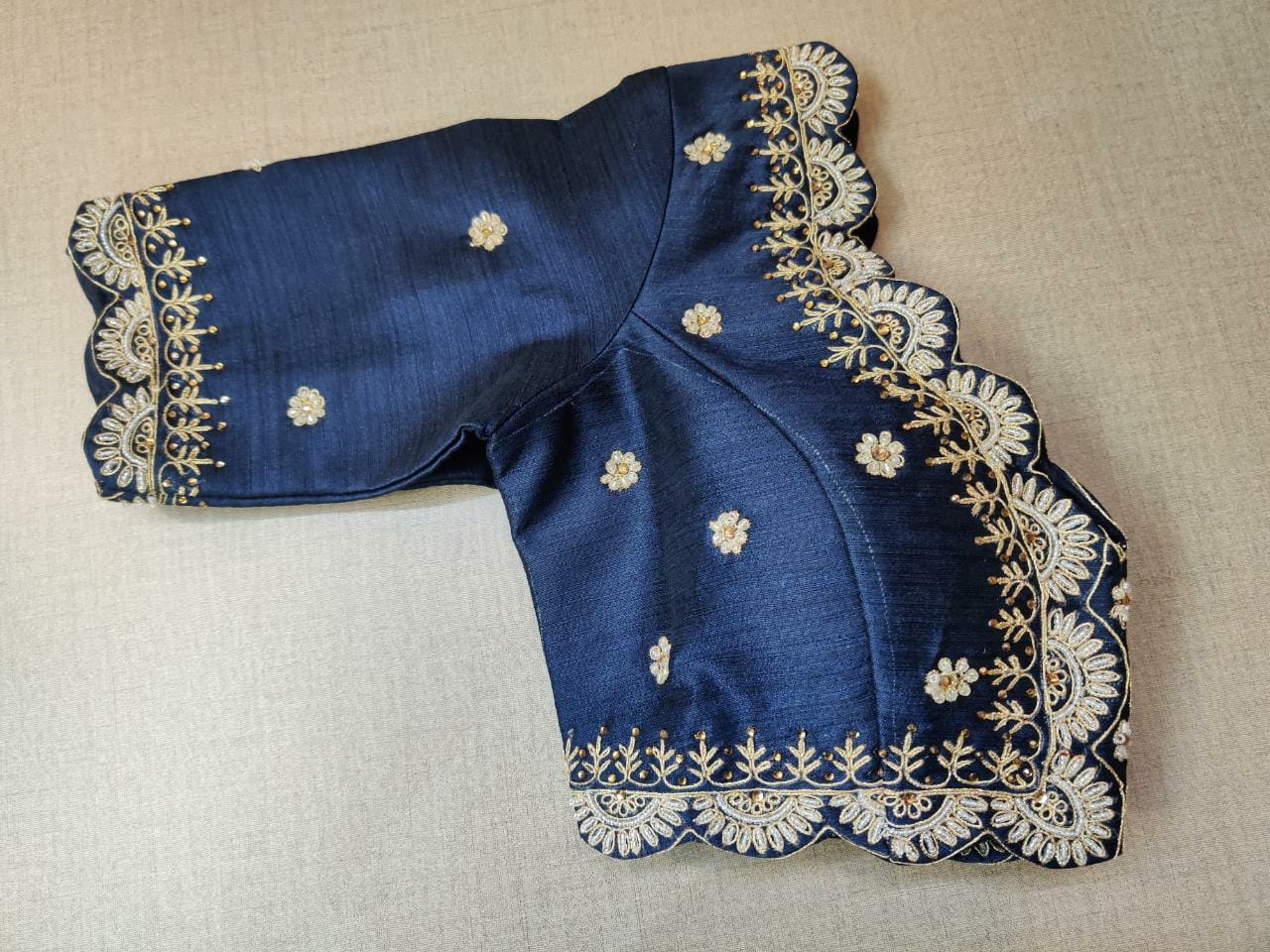 Buy beautiful dark blue embroidered saree blouse online in USA. Elevate your Indian ethnic saree looks with beautiful readymade saree blouse, embroidered saree blouses, Banarasi saree blouse, designer sari blouses, sleeveless saree blouses from Pure Elegance Indian fashion store in USA.-sleeves