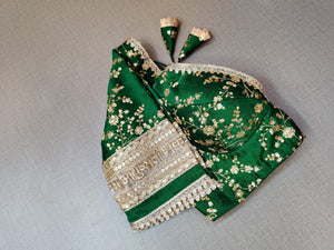 Buy this dark green embroidered saree blouse in online in USA. Pair this exquisite designer sari blouse with sweetheart  V-neckline, long sleeves, dori ties and beautiful golden lace border with ethnic sari, long sleeves, designer saree blouses online, sari blouses from Pure Elegance Indian fashion store in USA.- Sleeve.