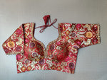 Shop this red kalamkari printed saree blouse in online in USA. Pair this exquisite designer sari blouse with sweetheart neckline, sleeves, dori ties, crafted with beautiful kalamkari work with ethnic sari, long sleeves, designer saree blouses online, sari blouses from Pure Elegance Indian fashion store in USA.- Front