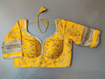 Buy yellow embroidered designer saree blouse with golden lace border,floral pattern and back open with hook online in USA. Pair this fancy designer sari blouse with mantra lace border, dori ties and long sleeve with ethnic sari, designer saree blouses online, sari blouse from Pure Elegance Indian fashion store in USA.- Front