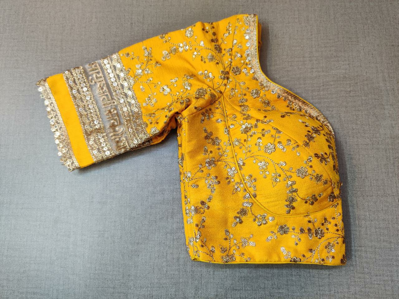 Buy yellow embroidered designer saree blouse with golden lace border,floral pattern and back open with hook online in USA. Pair this fancy designer sari blouse with mantra lace border, dori ties and long sleeve with ethnic sari, designer saree blouses online, sari blouse from Pure Elegance Indian fashion store in USA.- Sleeve.