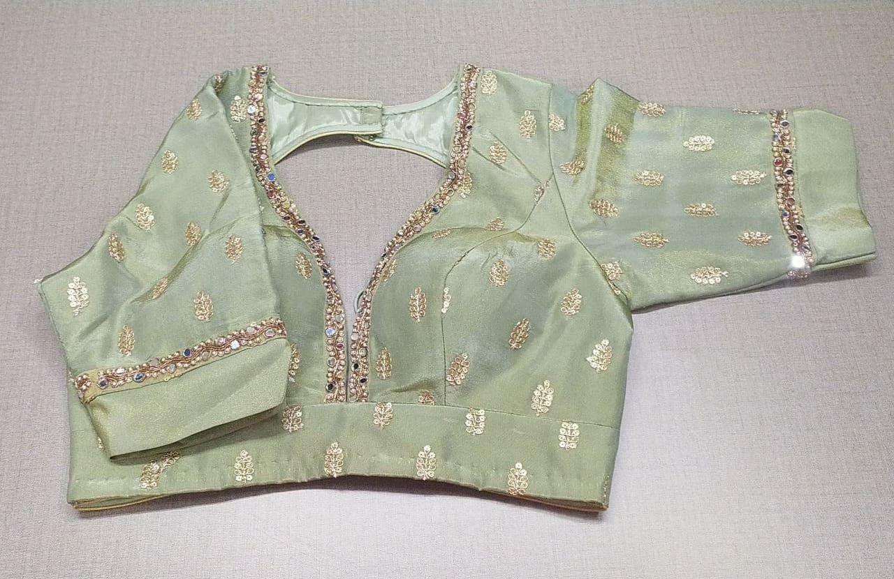 Buy stunning pastel green embroidered saree blouse online in USA. Elevate your Indian ethnic sarees with beautiful readymade sari blouses, embroidered saree blouses, Banarasi saree blouse, designer sari blouses, choli-cut blouses from Pure Elegance Indian fashion store in USA.-full view