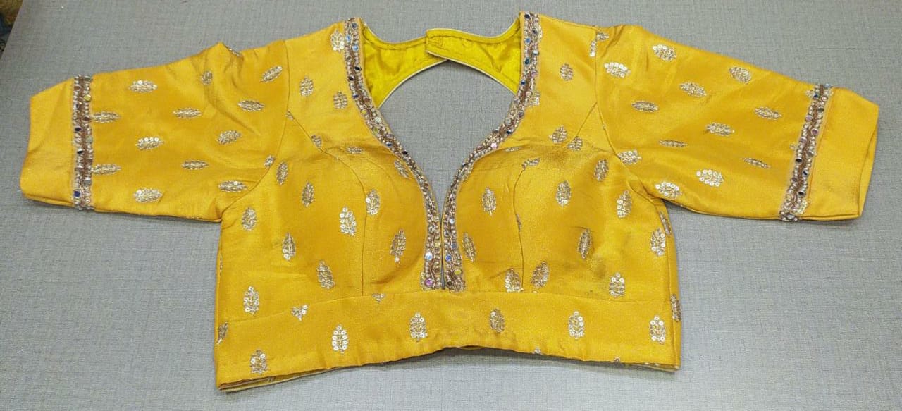 Buy beautiful yellow embroidered readymade saree blouse online in USA. Elevate your Indian ethnic sarees with beautiful readymade sari blouses, embroidered saree blouses, Banarasi saree blouse, designer sari blouses, choli-cut blouses from Pure Elegance Indian fashion store in USA.-full view