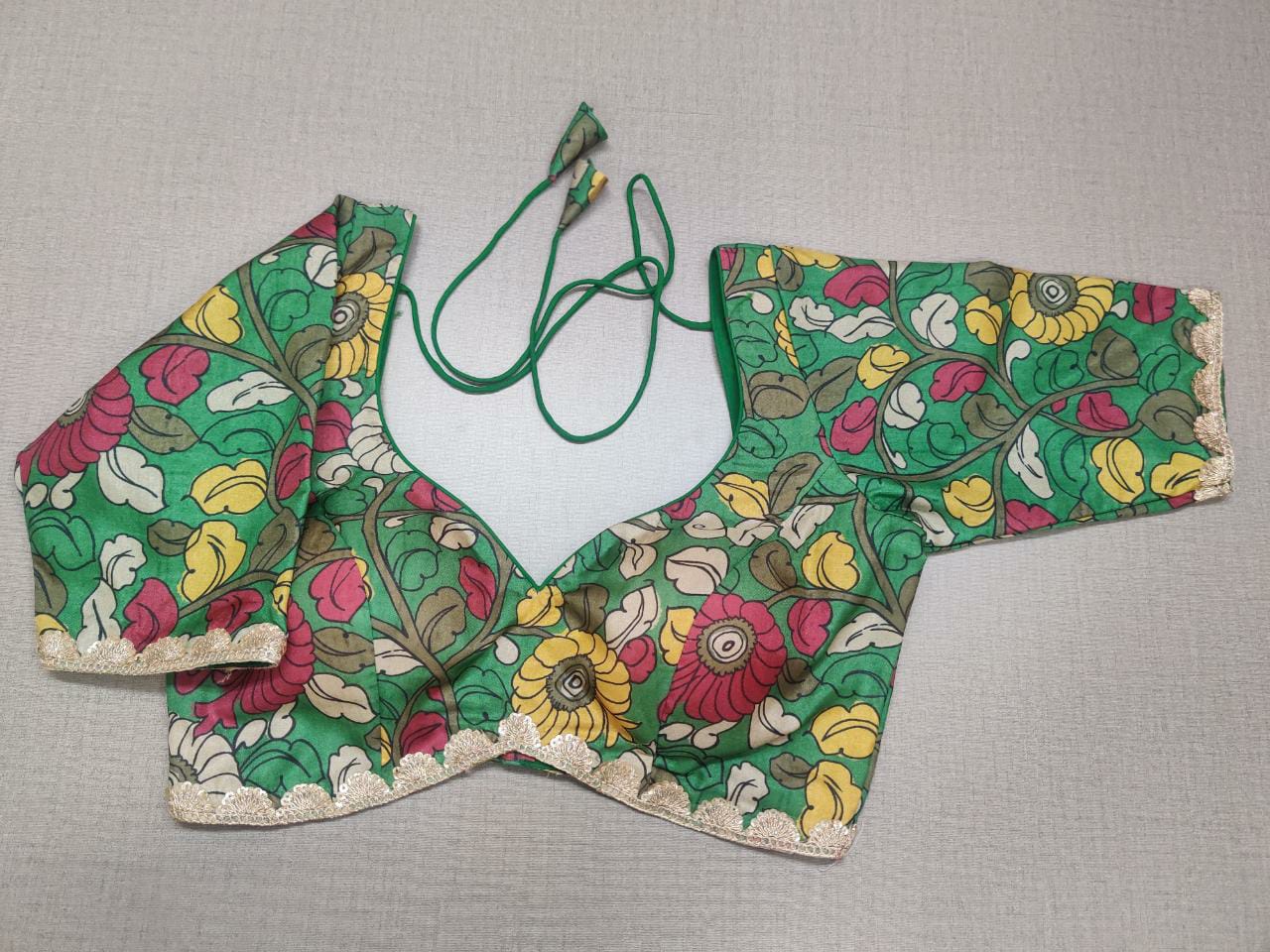 Buy stunning green Kalamkari print saree blouse online in USA. Elevate your Indian ethnic sarees with beautiful readymade sari blouses, embroidered saree blouses, Banarasi saree blouse, designer sari blouses, choli-cut blouses from Pure Elegance Indian fashion store in USA.-full view