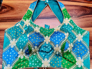 Buy blue and green Bandhej silk embroidered designer saree blouse online in USA. Elevate your ethnic saree style with a tasteful collection of designer saree blouses, fancy sari blouses, embroidered saree blouses from Pure Elegance Indian clothing store in USA.-front