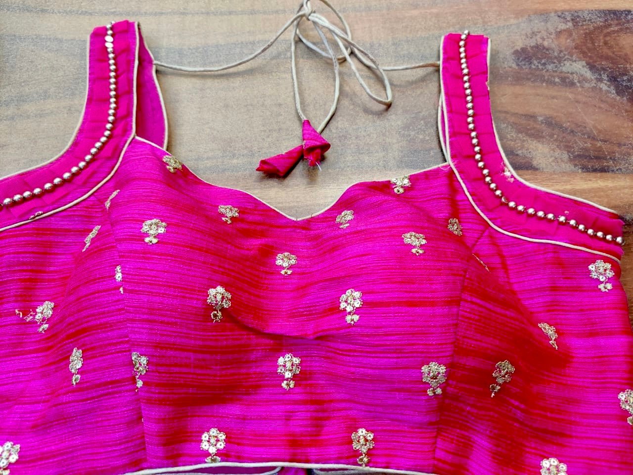 Shop fuschia pink designer sari blouse online in USA with embroidery. Elevate your ethnic saree style with a tasteful collection of designer sari blouses, embroidered saree blouses, Banarasi blouse, silk sari blouse from Pure Elegance Indian clothing store in USA.-front
