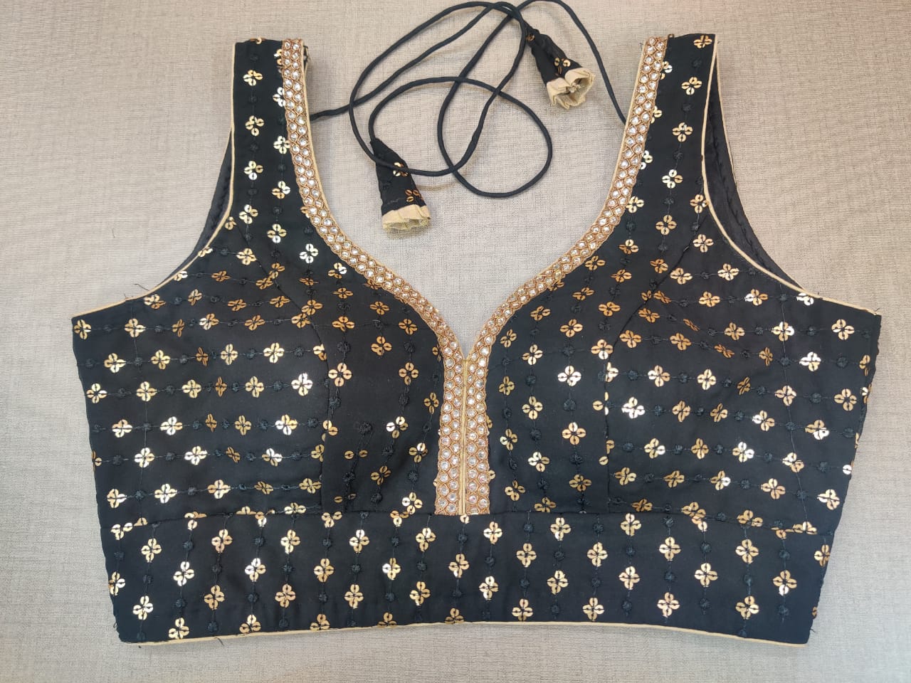 black sequin sleeveless blouse