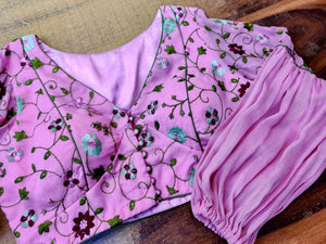 Buy stunning mauve pink embroidered saree blouse online in USA with balloon sleeves. Elevate your ethnic saree style with a tasteful collection of designer sari blouses, embroidered saree blouses, Banarasi blouse, silk sari blouse from Pure Elegance Indian clothing store in USA.-front