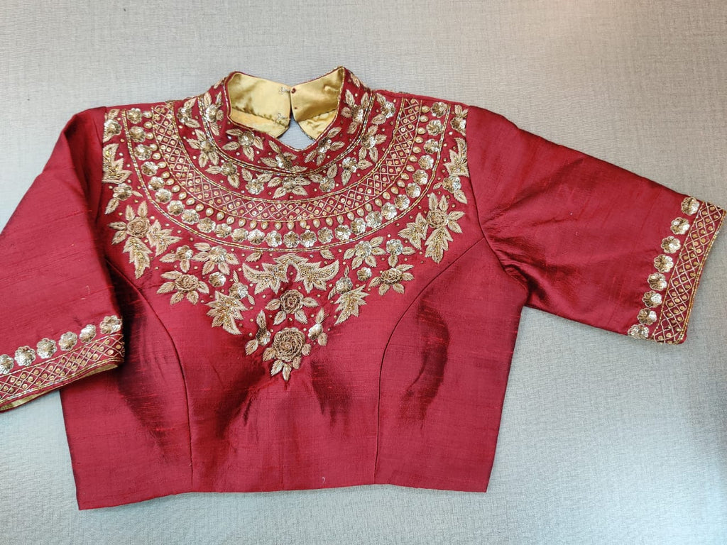 Buy stunning maroon embroidered designer sari blouse online in USA. Elevate your Indian ethnic sari looks with exquisite readymade saree blouse, embroidered saree blouses, Banarasi sari blouse, designer saree blouse from Pure Elegance Indian clothing store in USA.-full view