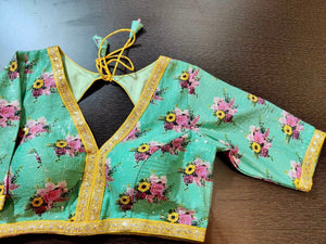 Shop mint green floral sari blouse online in USA with yellow embroidered lace. Elevate your ethnic sari style with a stunning collection of designer saree blouses, embroidered saree blouses, Banarasi sari blouse, silk sari blouse from Pure Elegance Indian clothing store in USA.-full view