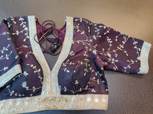 Buy stunning plum color embroidered designer blouse online in USA. Elevate your ethnic sari style with a stunning collection of designer sari blouses, embroidered saree blouses, Banarasi sari blouse, fancy sari blouse from Pure Elegance Indian clothing store in USA.-front