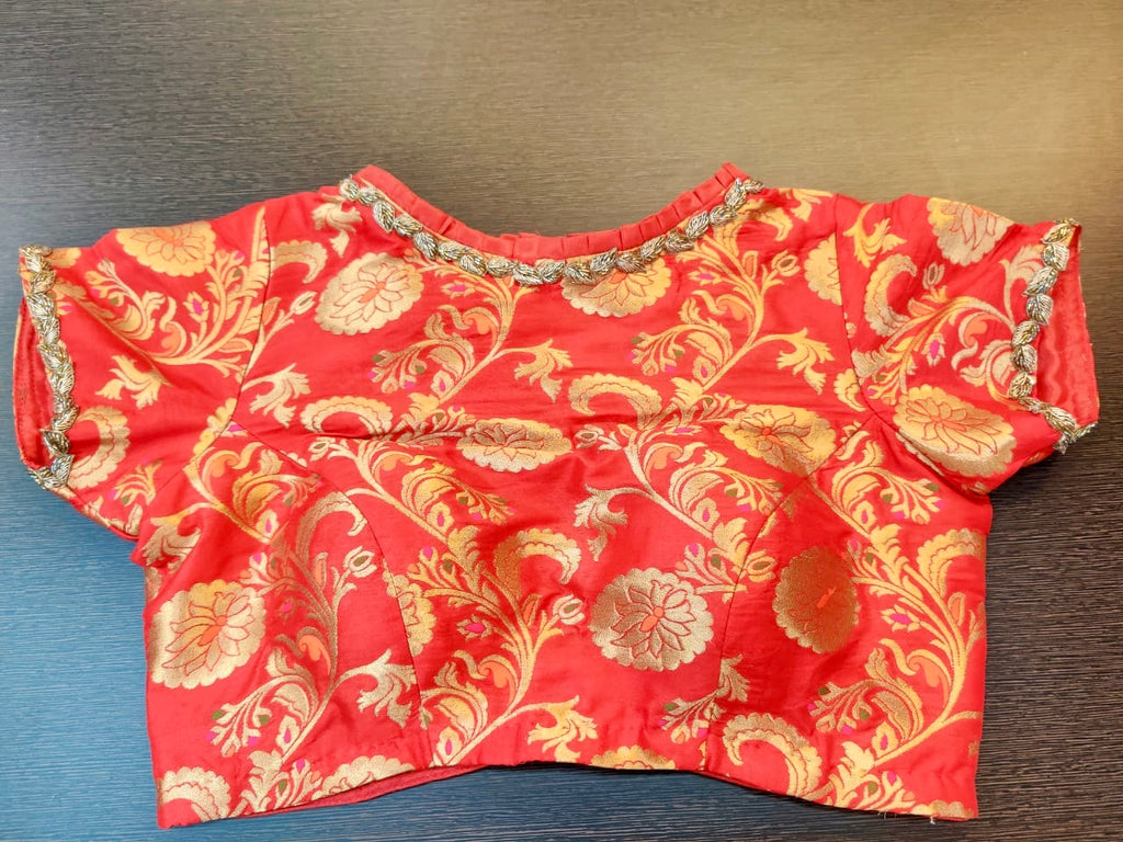 Buy stunning red embroidered sari blouse online in USA with floral zari work. Elevate your ethnic sari style with a stunning collection of designer sari blouses, embroidered sari blouses, Banarasi sari blouse, fancy sari blouse from Pure Elegance Indian clothing store in USA.-front