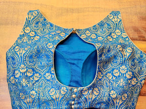 Buy stunning blue sleeveless Banarasi saree blouse online in USA. Elevate your traditional sari style with a stunning collection of designer sari blouses, embroidered saree blouses, Banarasi sari blouse, fancy saree blouse from Pure Elegance Indian clothing store in USA.-back