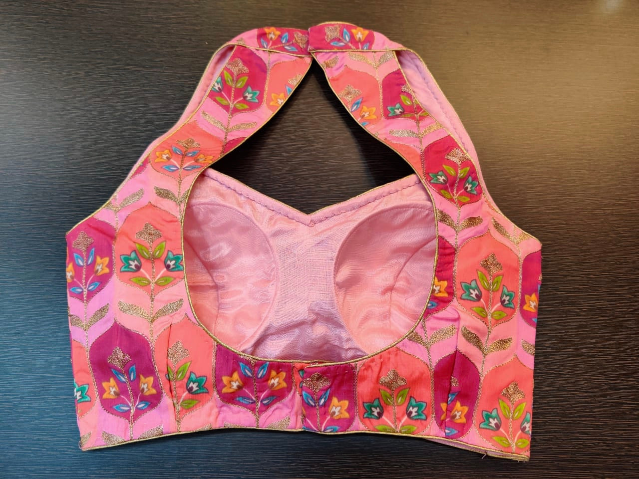 Buy stunning pink embroidered halter neck saree blouse online in USA with floral print. Elevate your Indian saree style with exquisite designer sari blouses, embroidered saree blouses, Banarasi saree blouse, fancy saree blouse from Pure Elegance Indian clothing store in USA.-back