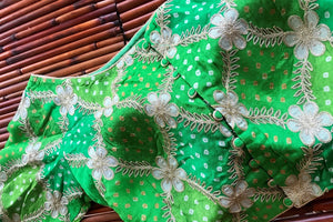Shop stunning two-tone green embroidered Bandhej sari blouse online in USA. Elevate your Indian saree style with exquisite readymade sari blouses, embroidered saree blouses, Benarasi saree blouse, fancy saree blouse from Pure Elegance Indian clothing store in USA.-back