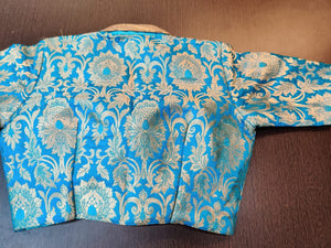 Buy beautiful light blue Banarasi readymade sari blouse online in USA with collars. Elevate your Indian saree style with beautiful readymade sari blouses, embroidered saree blouses, saree blouse, fancy saree blouse from Pure Elegance Indian clothing store in USA.-back