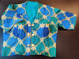 Shop stunning two-tone blue embroidered Bandhani saree blouse online in USA. Elevate your Indian saree style with exquisite readymade saree blouses, embroidered saree blouses, Benarasi saree blouse, fancy saree blouse from Pure Elegance Indian clothing store in USA.-front
