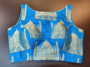 Shop beautiful blue Banarasi sleeveless saree blouse online in USA with Taj Mahal Buta. Elevate your Indian saree style with exquisite readymade saree blouses, embroidered saree blouses, Benarasi saree blouse, fancy saree blouse from Pure Elegance Indian clothing store in USA.-front