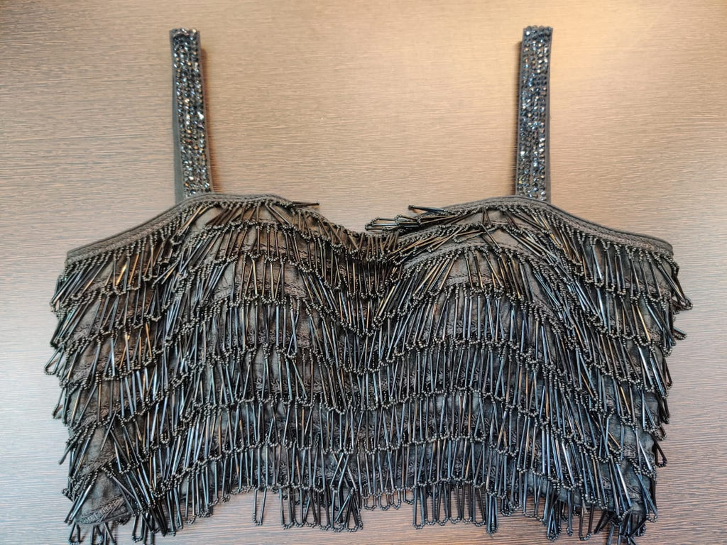 Shop stunning dark grey embellished fancy saree blouse online in USA. Elevate your ethnic saree look with beautiful readymade saree blouses, embroidered saree blouses, Benarasi sari blouse, fancy sari blouse from Pure Elegance Indian clothing store in USA.-front