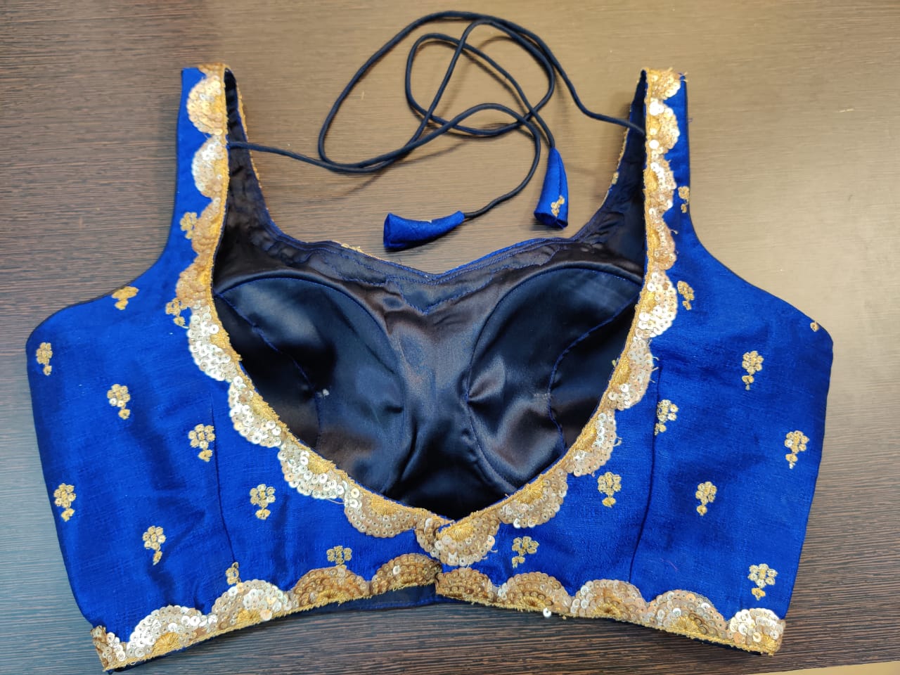 Shop ink blue embroidered sleeveless saree blouse online in USA. Elevate your ethnic sari look with beautiful readymade sari blouses, embroidered saree blouses, Banarasi sari blouse, fancy sari blouse from Pure Elegance Indian clothing store in USA.-back