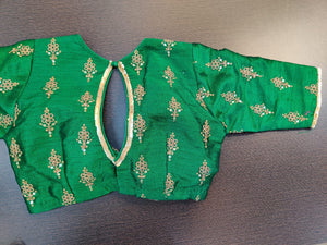 Buy bottle green embroidered designer saree blouse online in USA. Elevate your ethnic sari look with beautiful readymade sari blouses, embroidered saree blouses, Banarasi sari blouse, fancy sari blouse from Pure Elegance Indian clothing store in USA.-back