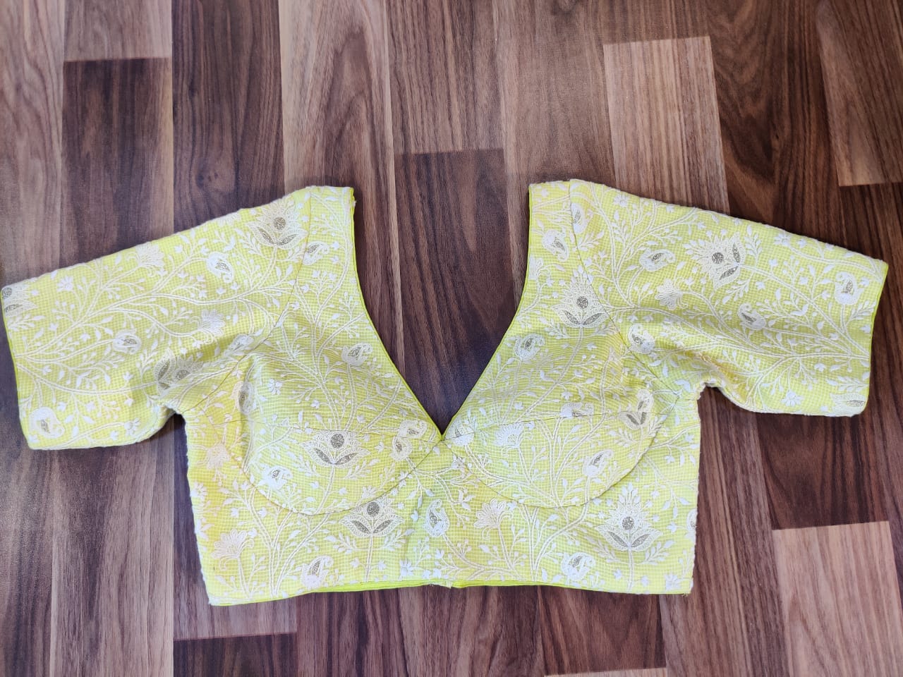 Buy stunning lemon yellow embroidered designer sari blouse online in USA. Elevate your Indian saree style with exquisite readymade saree blouses, embroidered saree blouses, Benarasi saree blouse, fancy saree blouse from Pure Elegance Indian clothing store in USA.-front