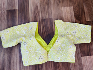 Buy stunning lemon yellow embroidered designer sari blouse online in USA. Elevate your Indian saree style with exquisite readymade saree blouses, embroidered saree blouses, Benarasi saree blouse, fancy saree blouse from Pure Elegance Indian clothing store in USA.-back