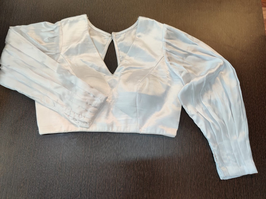 Shop stunning white designer saree blouse online in USA. Elevate your Indian saree style with exquisite readymade sari blouses, embroidered saree blouses, Banarasi saree blouse, fancy saree blouse from Pure Elegance Indian clothing store in USA.-front