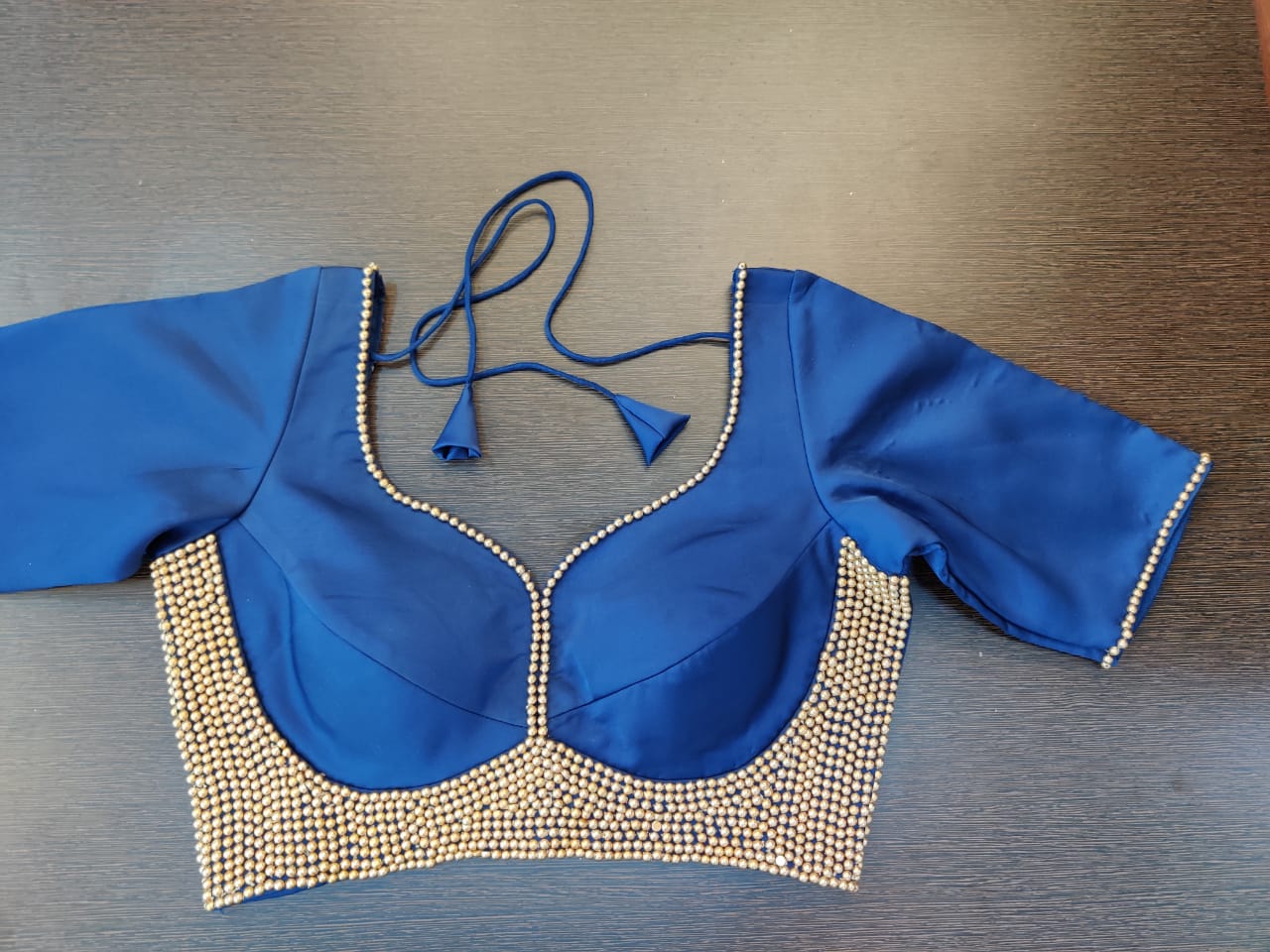 Buy beautiful blue readymade saree blouse online in USA with pearl embroidery. Elevate your Indian saree style with exquisite readymade saree blouses, embroidered saree blouses, Banarasi saree blouse, fancy saree blouse from Pure Elegance Indian clothing store in USA.-front