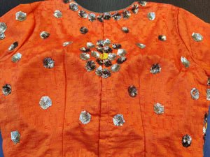 Buy beautiful orange sequin and bead embroidery saree blouse online in USA. Elevate your Indian saree style with exquisite readymade saree blouses, embroidered saree blouses, Banarasi sari blouse, fancy saree blouse from Pure Elegance Indian clothing store in USA.-back