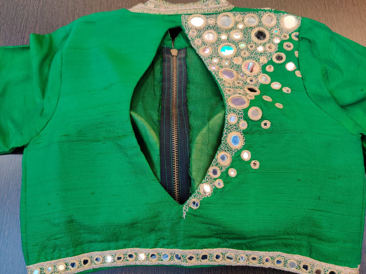 Buy stunning green mirror embroidery saree blouse online in USA with mandarin collar. Elevate your Indian saree style with exquisite readymade saree blouses, embroidered saree blouses, Banarasi sari blouse, fancy saree blouse from Pure Elegance Indian clothing store in USA.-back
