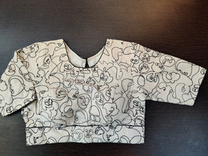 Buy stunning off-white and black abstract embroidery saree blouse online in USA. Elevate your Indian saree style with exquisite readymade sari blouses, embroidered saree blouses, Benarasi saree blouse, fancy saree blouse from Pure Elegance Indian clothing store in USA.-front