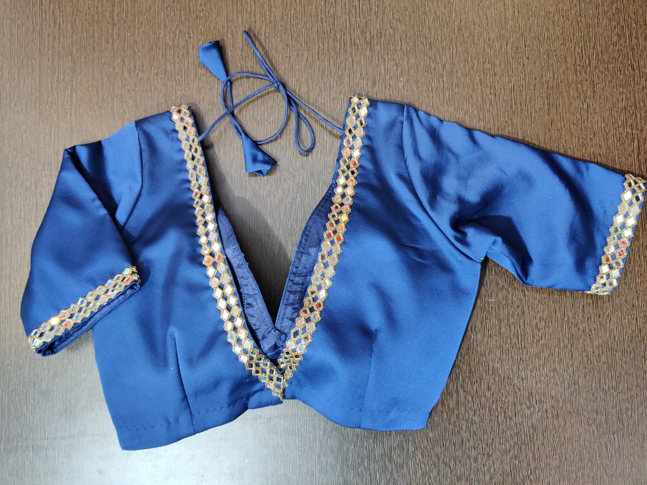 Shop stunning blue saree blouse online in USA with mirror work. Elevate your Indian saree style with exquisite readymade saree blouses, embroidered saree blouses, Benarasi sari blouse, designer saree blouse from Pure Elegance Indian clothing store in USA.-back