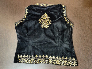 Shop gorgeous black velvet sleeveless saree blouse online in USA with gota patti work. Elevate your Indian saree style with exquisite readymade saree blouses, embroidered saree blouses, Benarasi sari blouse, designer saree blouse from Pure Elegance Indian clothing store in USA.-back